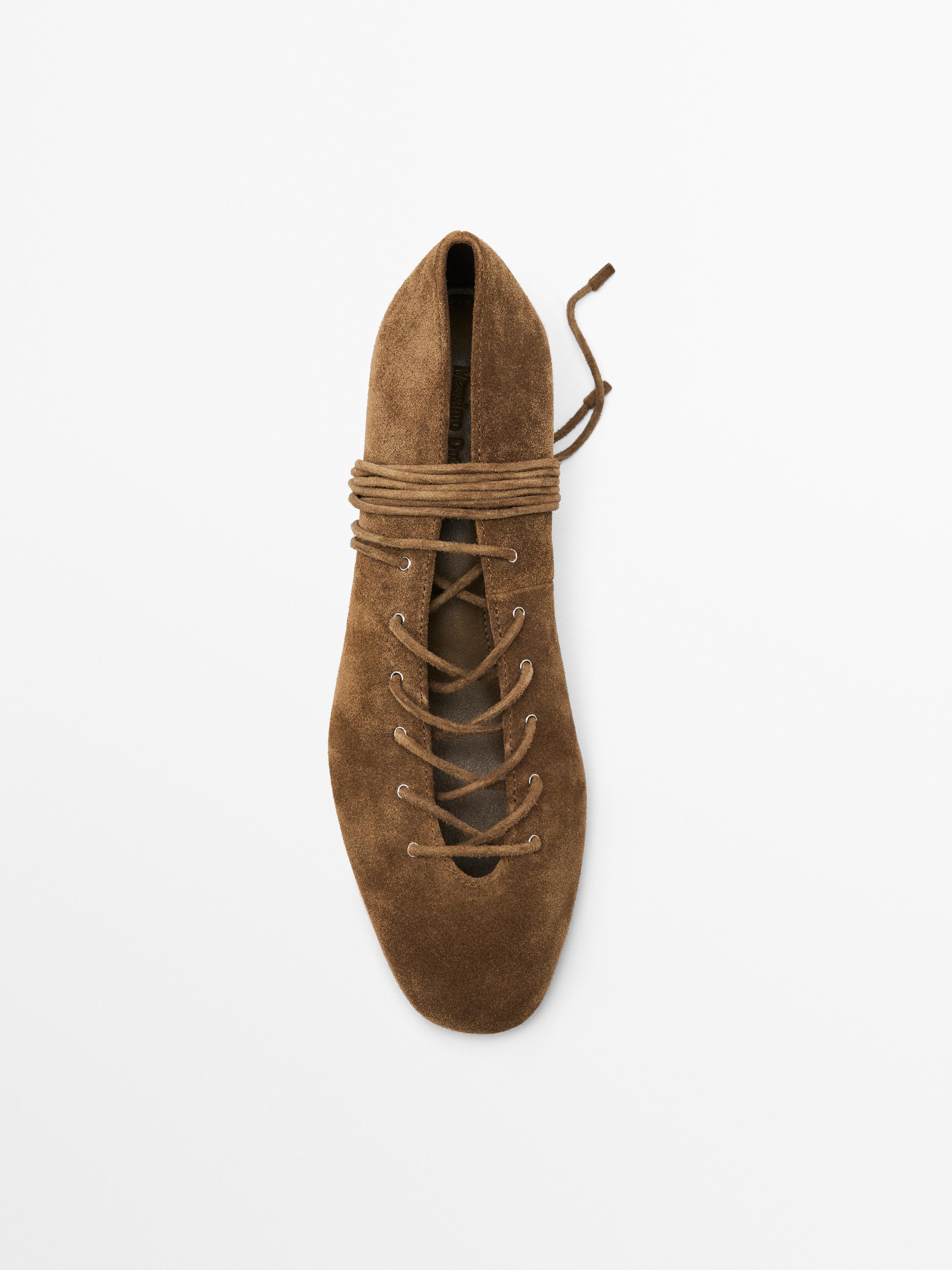 Lace-up high heel shoes